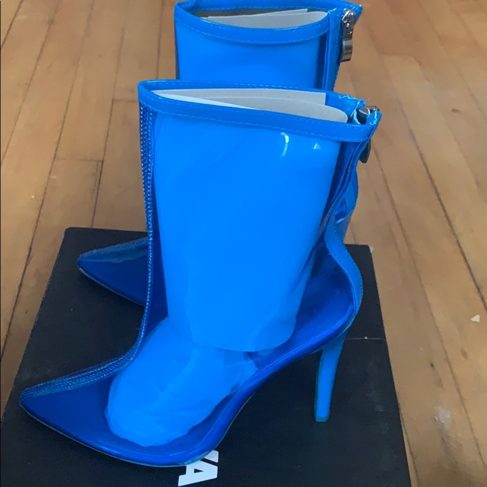 Clear blue heeled boots